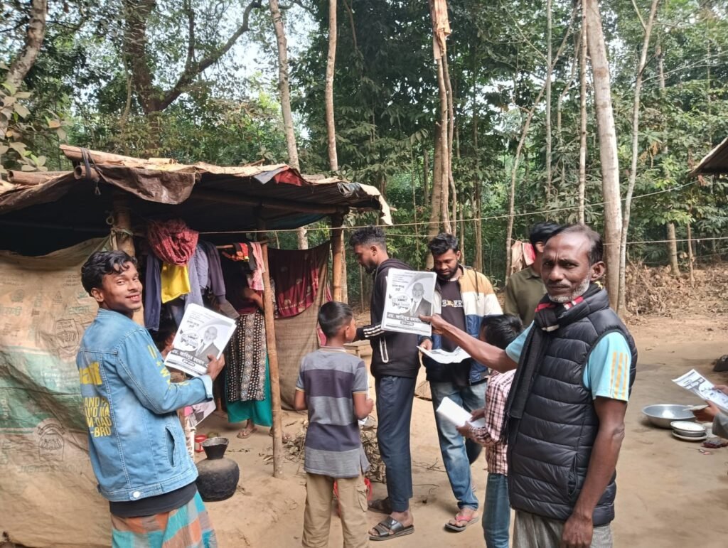 May be an image of one or more people, motorcycle, tree and text