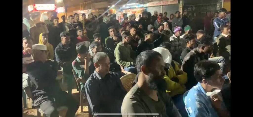 May be an image of one or more people, crowd and text